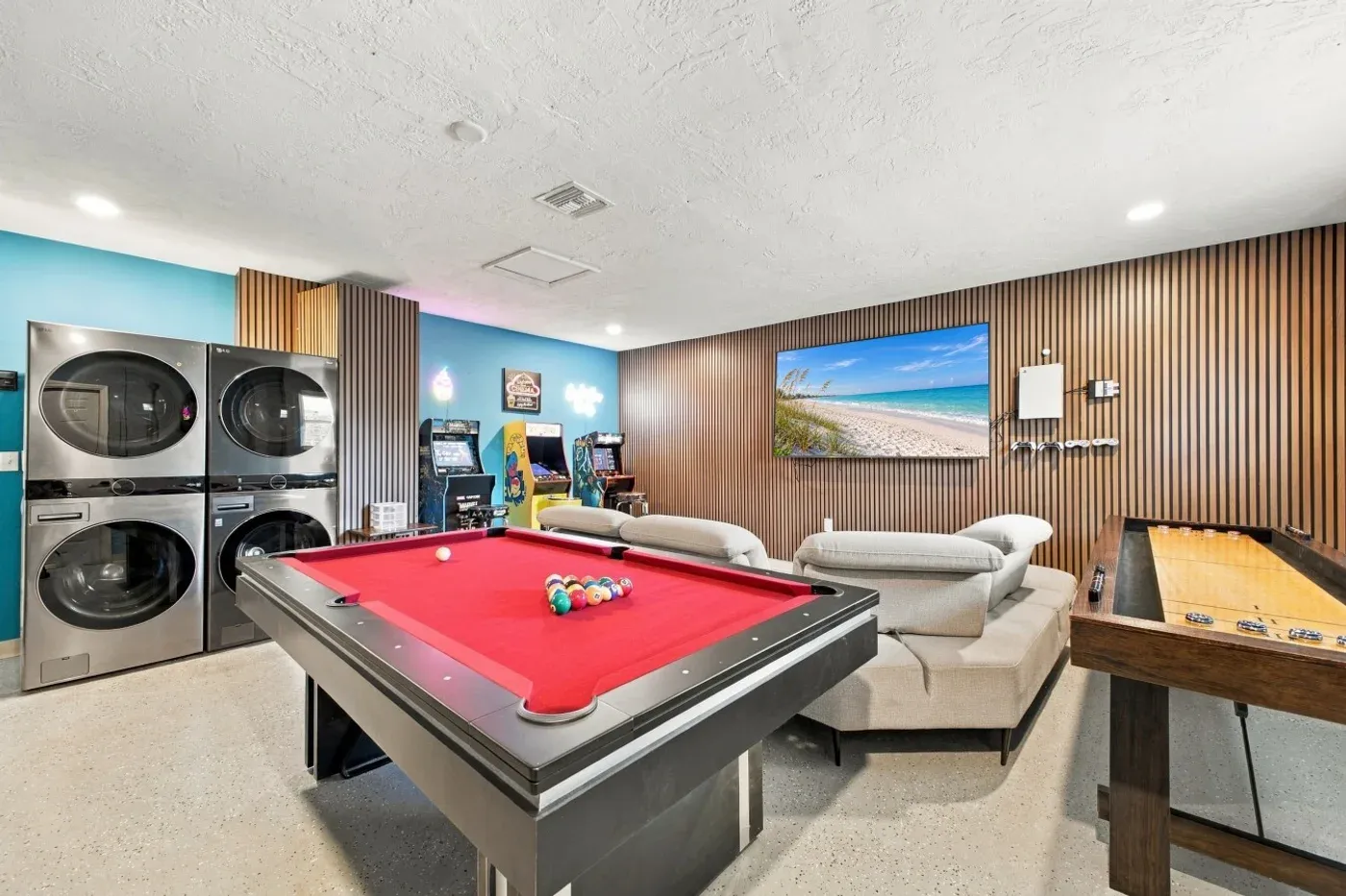 The Coastal — Air-conditioned game room with pool table