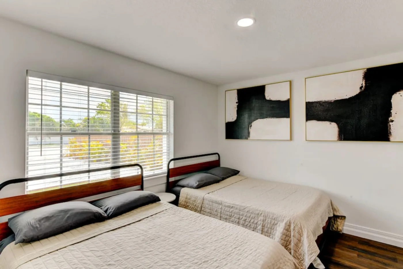 The Oasis — Bedroom with two beds